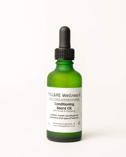 Green bottle of CL&RE Wellness Conditioning Beard Oil on a white background