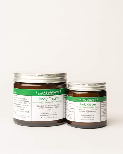 Two jars of CL&RE Wellness Body Cream with Rosemary, Lemon & Sweet Orange on a white background